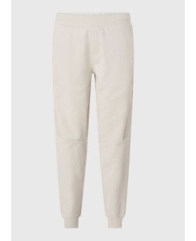 Calvin Klein spodnie dresowe Logo Tape Com beżowy L Kolor beżowy Rozmiar1 L